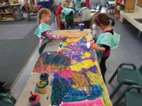 Children painting at the BC Center