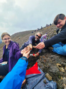 SUNY Broome group toasting the eruption with the classic Icelandic candy bar, Hraun, which translates to lava.