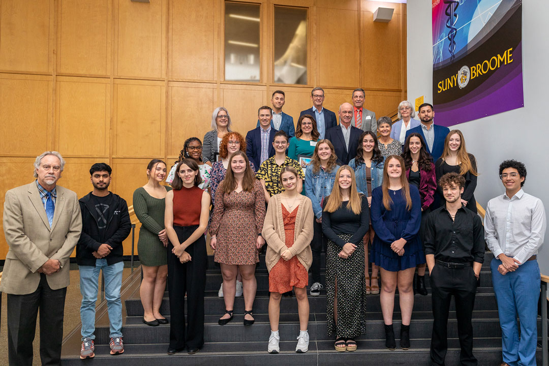 PHS students and donors stand on the stairs in Decker for a photo.