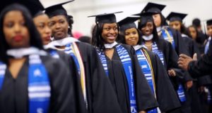 Image of women in graduation gowns.