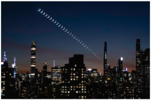 The Moon Setting over the City that Never Sleeps by Maya Singh